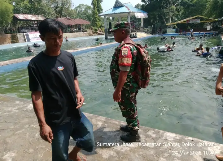 Babinsa Hadir Di Tengah Wisata Alam, Ingatkan Pengunjung Utamakan Keselamatan Di PAS Mariah Jambi.